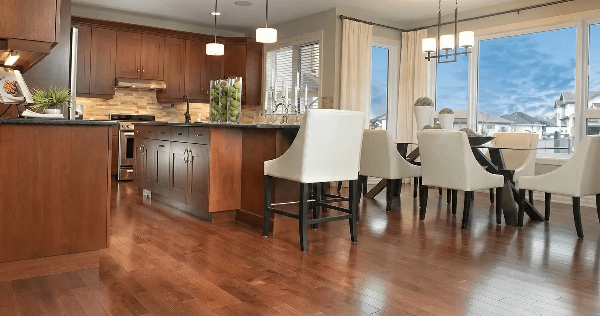 A modern kitchen with professionally installed wood flooring in Indianapolis, IN
