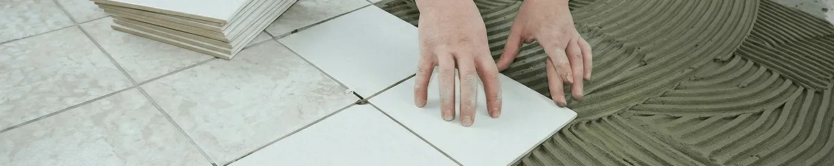 Professional installing white tile floors in Indianapolis, IN
